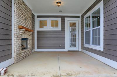 1006D Covered Lanai with Fireplace. The Barnwell New Home in Westfield, IN