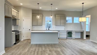Open Concept Kitchen & Harvest Area. New Home in Westfield, IN